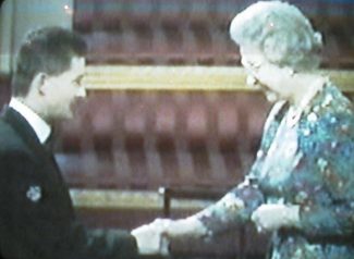 Norman Mansell MBE with the queen